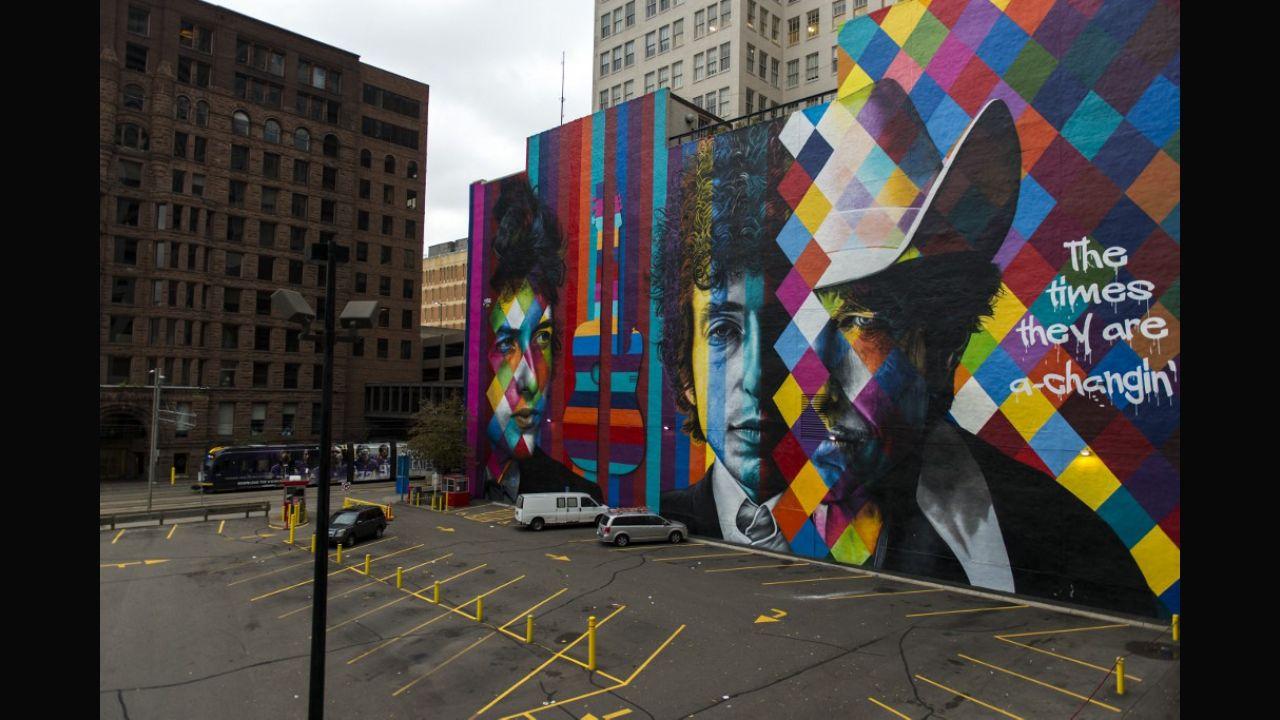 A mural of songwriter Bob Dylan by Brazilian artist Eduardo Kobra on display in downtown Minneapolis, Minnesota on October 15, 2016. On October 13, 2016, Dylan had been awarded the Nobel Prize in Literature. 
Photo: Stephen Maturen / AFP